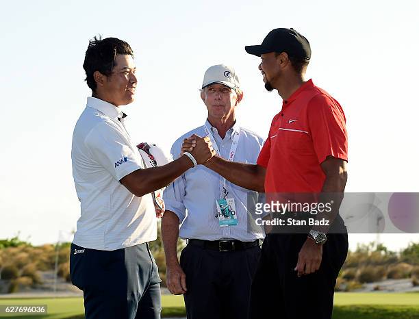 Hideki Matsuyama of Japan is congratulated by tournament host Tiger Woods on winning the Hero World Challenge at Albany course on December 4, 2016 in...