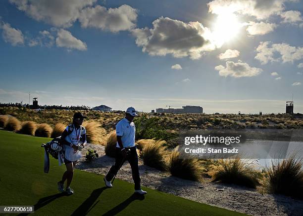 Hideki Matsuyama of Japan approaches the 17th green during the final round of the Hero World Challenge at Albany course on December 4, 2016 in...