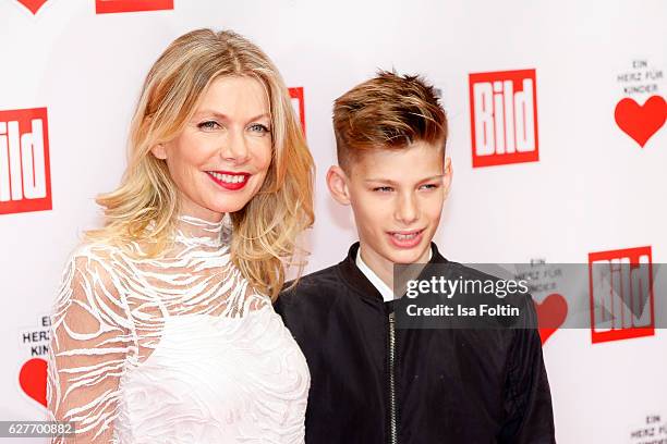 German actress Ursula Karven and her son Liam Taj Veres attend the Ein Herz Fuer Kinder gala on December 3, 2016 in Berlin, Germany.