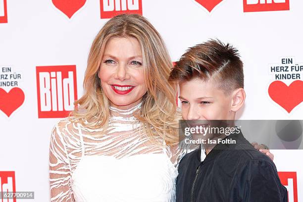 German actress Ursula Karven and her son Liam Taj Veres attend the Ein Herz Fuer Kinder gala on December 3, 2016 in Berlin, Germany.