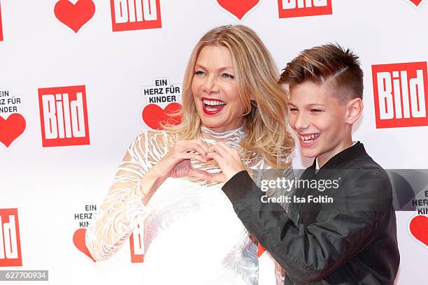 German actress Ursula Karven and her son Liam Taj Veres attend the Ein Herz Fuer Kinder gala on December 3, 2016 in Berlin, Germany.