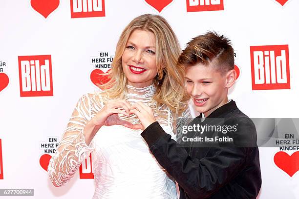 German actress Ursula Karven and her son Liam Taj Veres attend the Ein Herz Fuer Kinder gala on December 3, 2016 in Berlin, Germany.