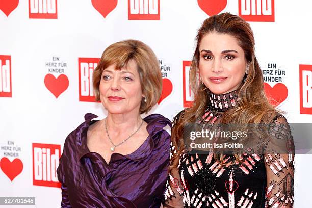 Queen Rania Al-Abdullah of Jordan and Daniela Schadt, girlfriend of the federal president of Germany attend the Ein Herz Fuer Kinder gala on December...