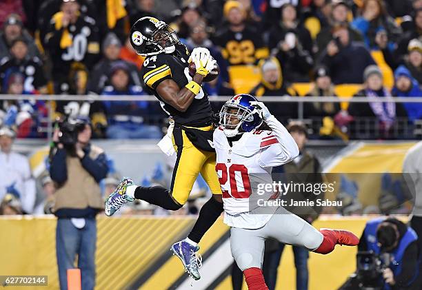 Antonio Brown of the Pittsburgh Steelers makes a reception over Janoris Jenkins of the New York Giants for a 22 yard touchdown in the second quarter...