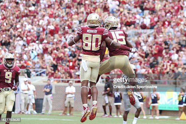 Florida State WR Travis Rudolph celebrates scoring a touchdown with Florida State WR Nyqwan Murray during the game between the Florida State...
