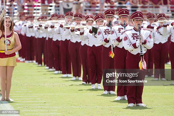 The Marching Chiefs and majorettes perform during the game between the Florida State Seminoles and the Charleston Southern Buccaneers at Doak...