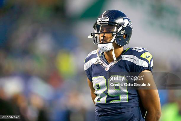 Wide receiver Doug Baldwin of the Seattle Seahawks warms up before a game against the Carolina Panthers at CenturyLink Field on December 4, 2016 in...