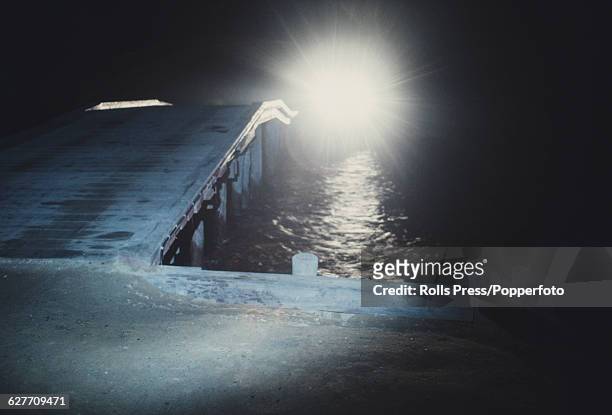9th August night view of a car approacing Dyke Bridge on Chappaquiddick Island, Massachusetts, the same bridge that Senator Ted Kennedy's car...