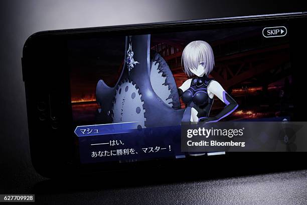 The Fate/Grand Order mobile game, produced by Sony Corp.'s Aniplex Inc., DELiGHTWORKS Inc. And creative studio Type-Moon, is displayed on the App...