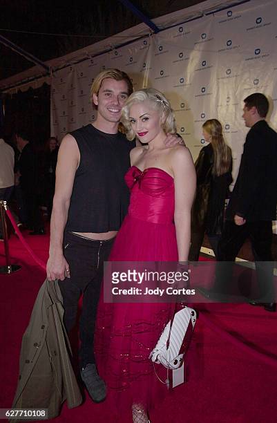 Gavin Rossdale and Gwen Stefani arrive at the Warner Brothers Grammy party.