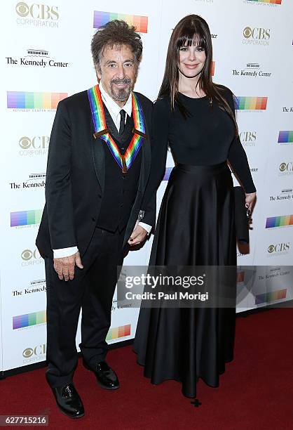 Honoree Al Pacino and Lucila Sola pose for a photo on the red carpet at the 39th Annual Kennedy Center Honors at The Kennedy Center on December 4,...