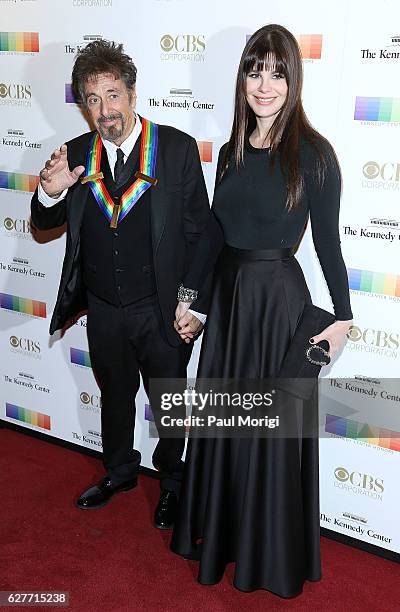 Honoree Al Pacino and Lucila Sola pose for a photo on the red carpet at the 39th Annual Kennedy Center Honors at The Kennedy Center on December 4,...