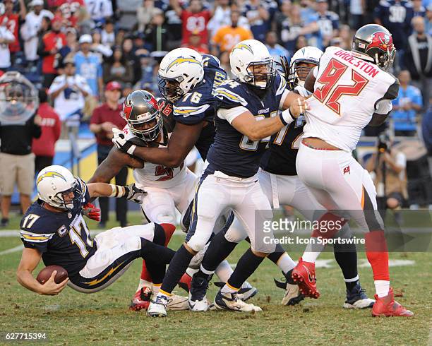 San Diego Chargers Quarterback Philip Rivers is sacked by Tampa Bay Buccaneers Defensive End Robert Ayers during the NFL football game between the...