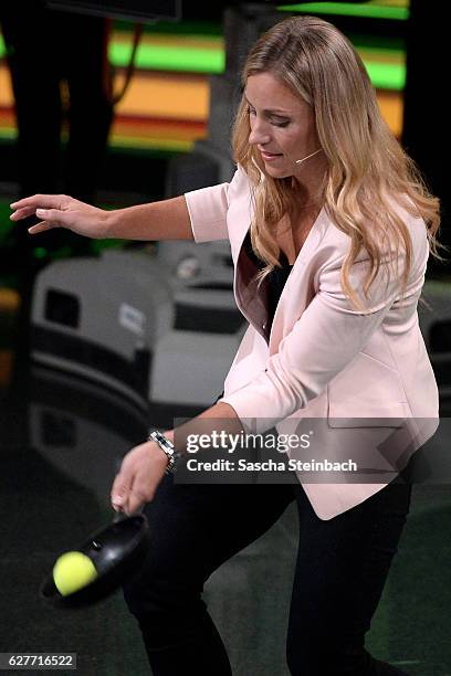 Angelique Kerber plays tennis with a pan during the television show 2016! Menschen, Bilder, Emotionen - RTL Jahresrueckblick on December 4, 2016 in...