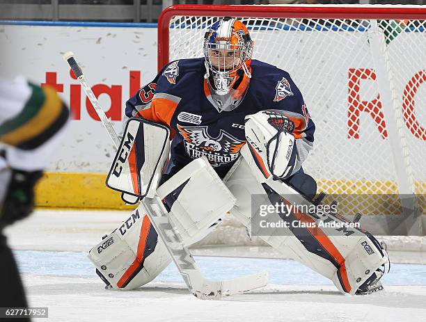 Garrett Forrest of the Flint Firebirds watches for a shot against the London Knights during an OHL game at Budweiser Gardens on December 4, 2016 in...