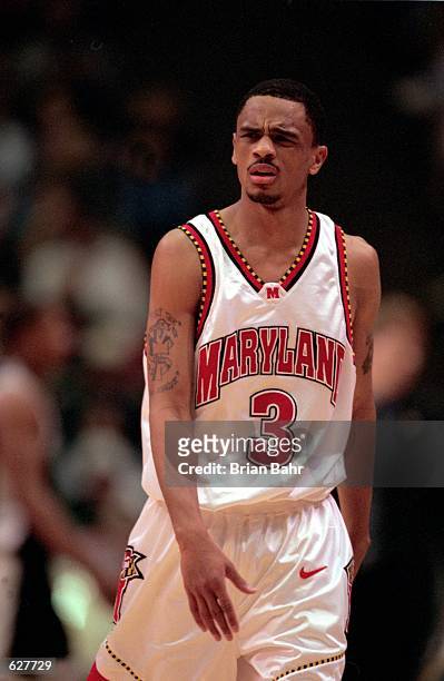 Juan Dixon of the Maryland Terrapins reacts to a playduring the game against the Georgia State Panthers at Boise State Pavilion in Boise, Idaho. The...