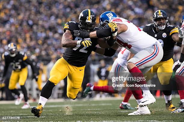 Pittsburgh Steelers Linebacker James Harrison is blocked by New York Giants Offensive Tackle Ereck Flowers while rushing the quarterback during the...