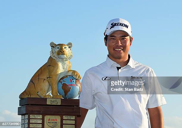 Hideki Matsuyama of Japan poses with his trophy after winning the Hero World Challenge at Albany course on December 4, 2016 in Nassau, Bahamas.
