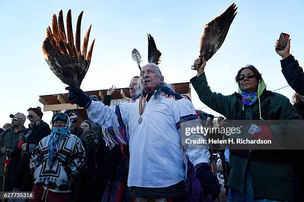 Native Americans celebrate at Oceti Sakowin camp on the Standing Rock Sioux Reservation on December 4, 2016 in Cannon Ball North Dakota, Colorado....