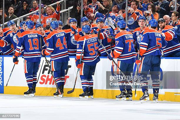 Patrick Maroon, Oscar Klefbom, Mark Letestu, Mark Fayne and Zack Kassian of the Edmonton Oilers celebrate after a goal during the game against the...
