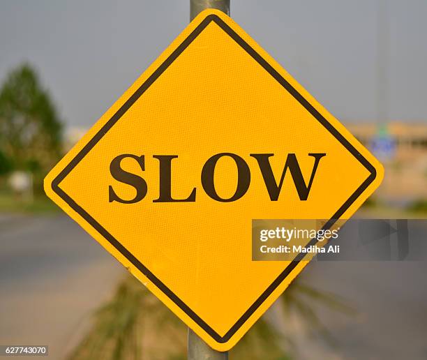 Approach Slow Sign Slow Sign On Road Photos and Premium High Res Pictures - Getty Images