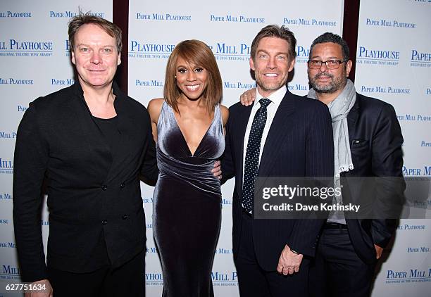 Guest, Deborah Cox, Judson Mills and Guest arrive at Ricalton's Village Tavern on December 4, 2016 in South Orange, New Jersey.