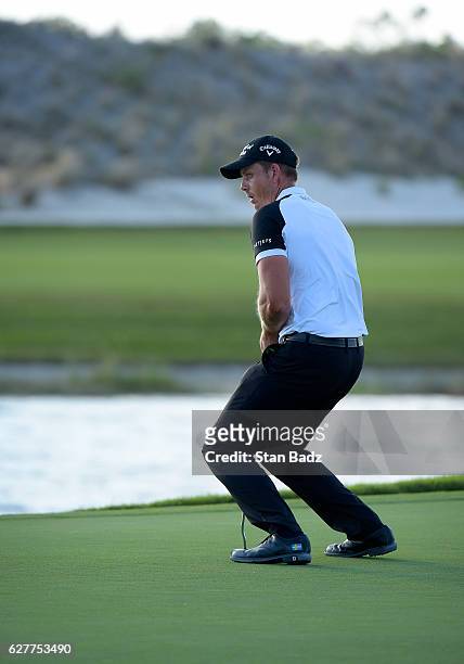 Henrik Stenson of Sweden reacts to his putt on the 17th hole during the final round of the Hero World Challenge at Albany course on December 4, 2016...