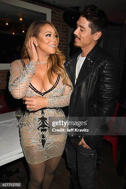 Recording Artist Mariah Carey and choreographer Bryan Tanaka attend MARIAH'S WORLD Viewing Party at Catch on December 4, 2016 in New York City.