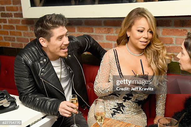 Choreographer Bryan Tanaka and recording artist Mariah Carey attend MARIAH'S WORLD Viewing Party at Catch on December 4, 2016 in New York City.