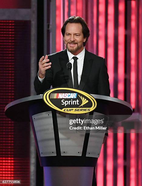 Singer/guitarist Eddie Vedder of Pearl Jam introduces NASCAR Sprint Cup Series driver Tony Stewart during the 2016 NASCAR Sprint Cup Series Awards...