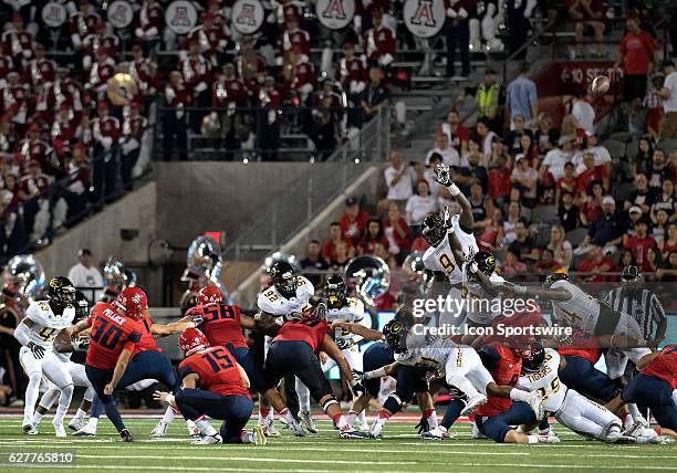 Arizona Wildcats place kicker Josh Pollack nails a field goal during the NCAA football game between the Grambling State Tigers and the Wildcats at...