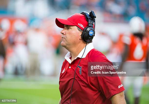 Florida Atlantic Owls Head Coach Charlie Partridge during the NCAA football game between the Florida Atlantic Owls and the University of Miami...