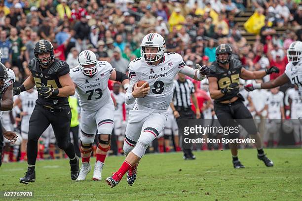 Cincinnati Bearcats quarterback Hayden Moore scrambles in for a rushing touchdown during the NCAA football game between the Purdue Boilermakers and...