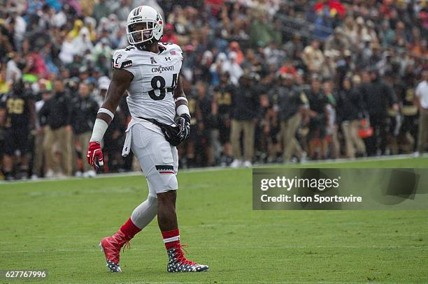 Cincinnati Bearcats wide receiver Nate Cole has american flag colors painted on his face during the NCAA football game between the Purdue...