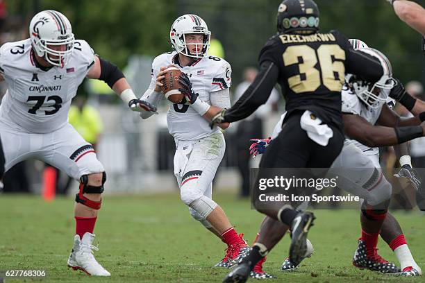 Cincinnati Bearcats quarterback Hayden Moore drops back during the NCAA football game between the Purdue Boilermakers and Cincinnati Bearcats at...