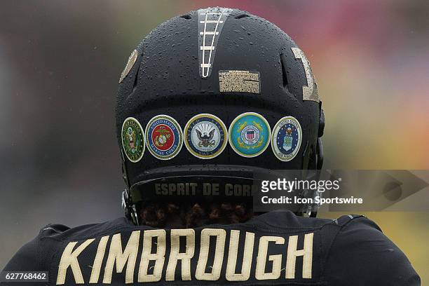 Purdue Boilermakers display stickers honoring the military branches on their helmets during the NCAA football game between the Purdue Boilermakers...