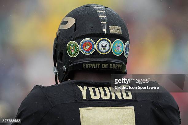 Decals on Purdue helmets honoring the branches of military during the NCAA football game between the Purdue Boilermakers and Cincinnati Bearcats at...