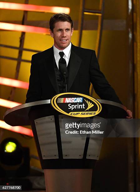 Sprint Cup Series driver Carl Edwards speaks during the 2016 NASCAR Sprint Cup Series Awards show at Wynn Las Vegas on December 2, 2016 in Las Vegas,...