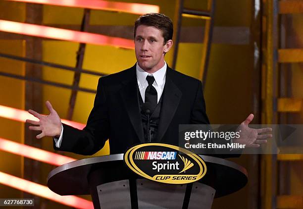 Sprint Cup Series driver Carl Edwards speaks during the 2016 NASCAR Sprint Cup Series Awards show at Wynn Las Vegas on December 2, 2016 in Las Vegas,...