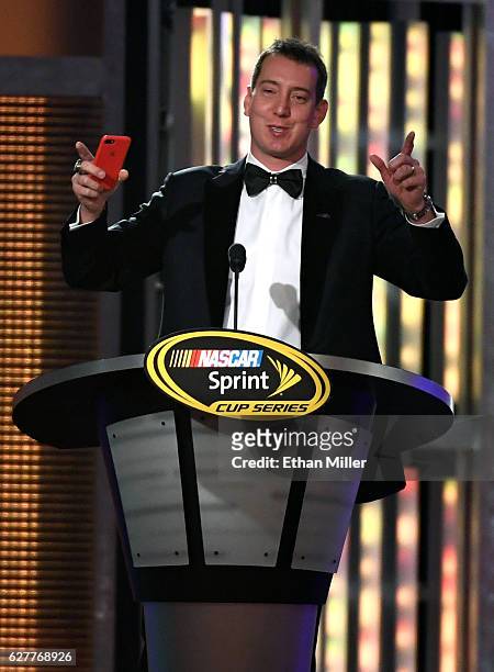 Sprint Cup Series driver Kyle Busch speaks during the 2016 NASCAR Sprint Cup Series Awards show at Wynn Las Vegas on December 2, 2016 in Las Vegas,...