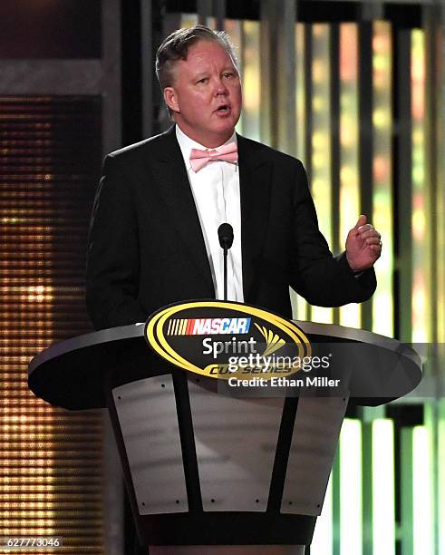 Chairman and CEO Brian France presents the Bill France Award of Excellence during the 2016 NASCAR Sprint Cup Series Awards show at Wynn Las Vegas on...