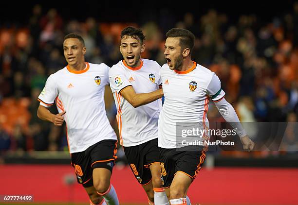 Alvaro Medran, Rodrigo Moreno and Munir El Haddadi of Valencia CF celebrates their goal during the La Liga match between Valencia CF vs Malaga CF at...