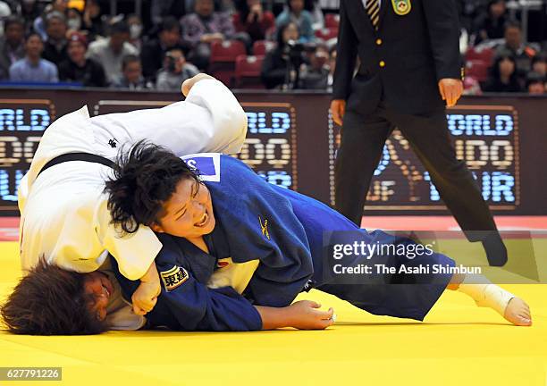 Sara Asahina of Japan throws Kanae Yamabe of Japan in the Women's +78kg semi final during day three of the Judo Grand Slam at Tokyo Metropolitan...