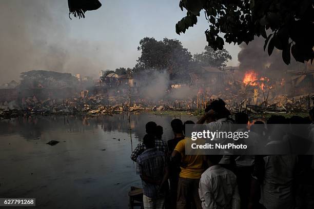 Fire is seen billowing out from the Korail Slum at Dhaka, Bangladesh, 04 December 2016. The flames left over 500 hundreds shanties, where over 3,000...