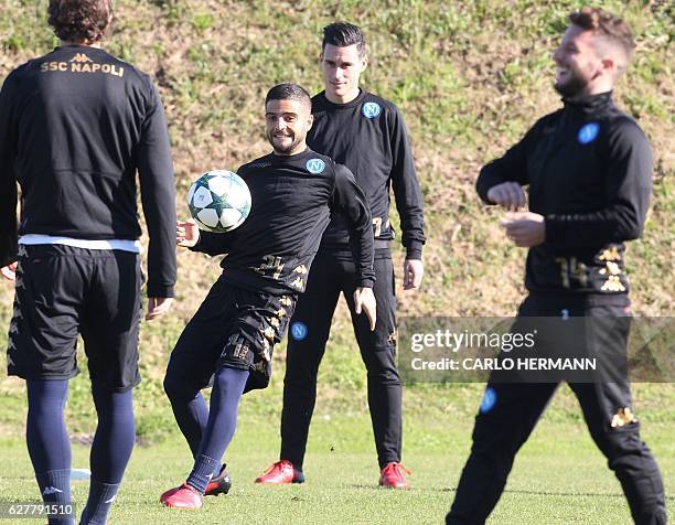 Napoli's forward from Italy Lorenzo Insigne controls the ball near teammate forward from Spain Jose Maria Callejon during a training session on the...