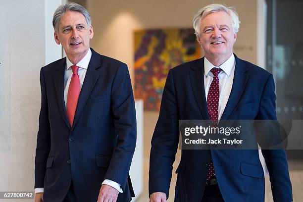 Chancellor of the Exchequer Philip Hammond and the Secretary of State for Exiting the European Union David Davis arrive for a meeting with executives...