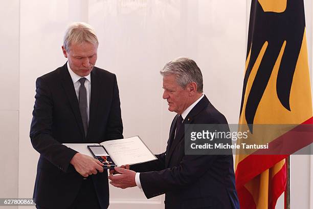 Ulrich Wessel director of the Joseph-Koenig Gymnasium in the town of Haltern receives the federal Cross of Merit from German State President Joachim...