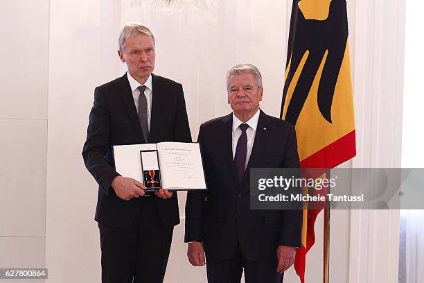 Ulrich Wessel director of the Joseph-Koenig Gymnasium in the town of Haltern receives the federal Cross of Merit from German State President Joachim...