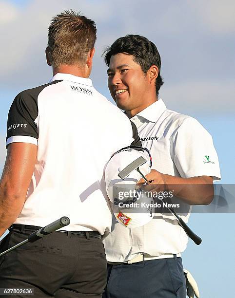 Hideki Matsuyama of Japan celebrates after completing the final round of the Hero World Challenge at Albany Golf Club in the Bahamas on Dec. 4, 2016....