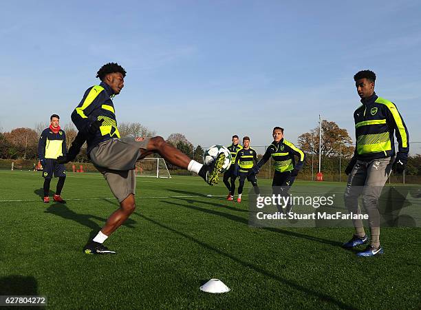 Ainsley Maitland-Niles and Gedion Zelalem of Arsenal during a training session at London Colney on December 5, 2016 in St Albans, England.